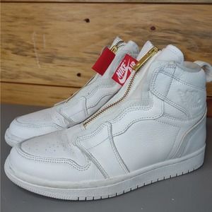 Jordan White High-Top Sneakers with Gold Zipper and Red Tag